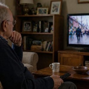 Psychology suggests many people over 70 who watch TV for hours may be coping with the loss of routine, purpose, and feeling needed